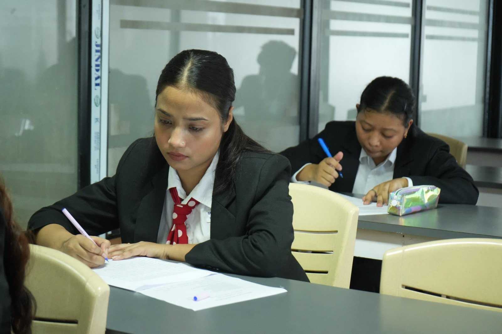 Students appearing for exams at Gateway Institute of Hotel Management.